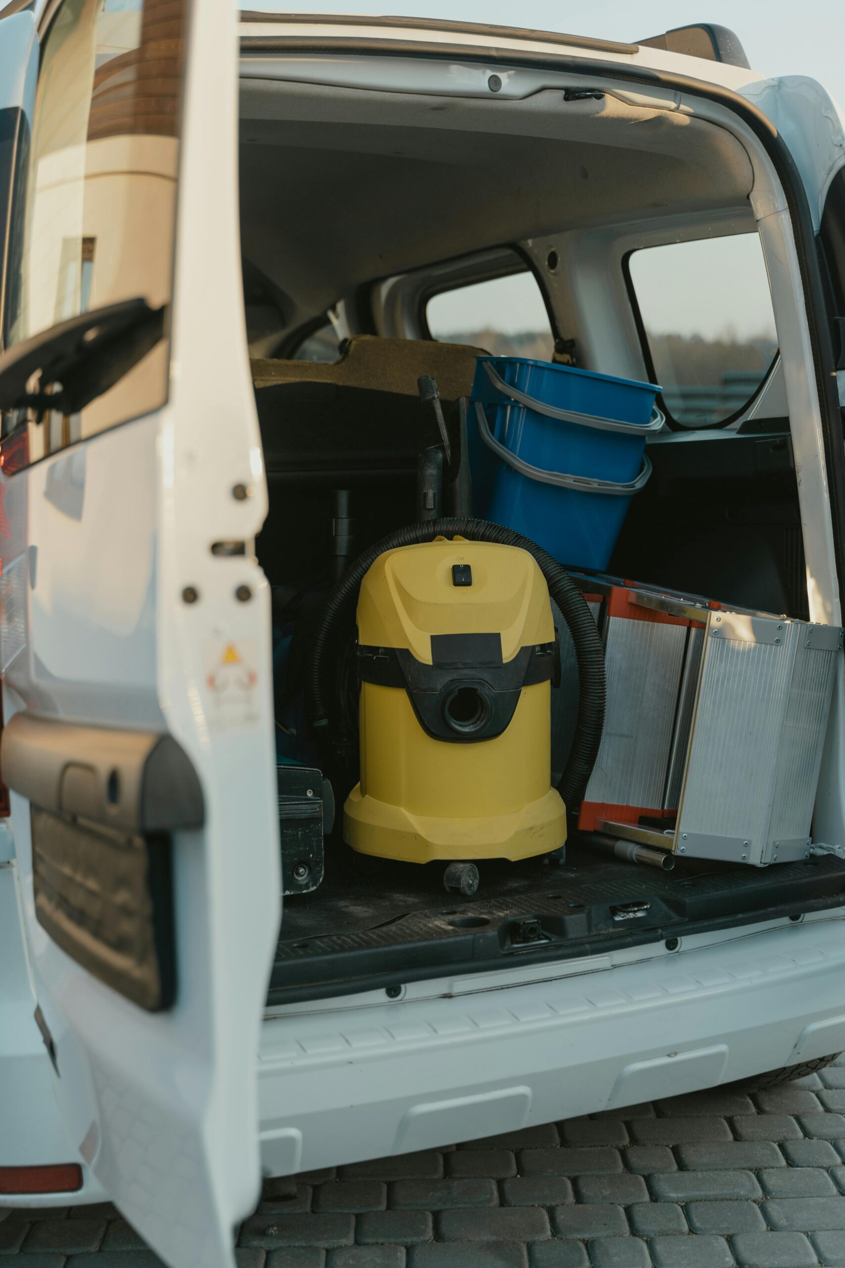 Professional cleaning vehicle with equipment ready for service