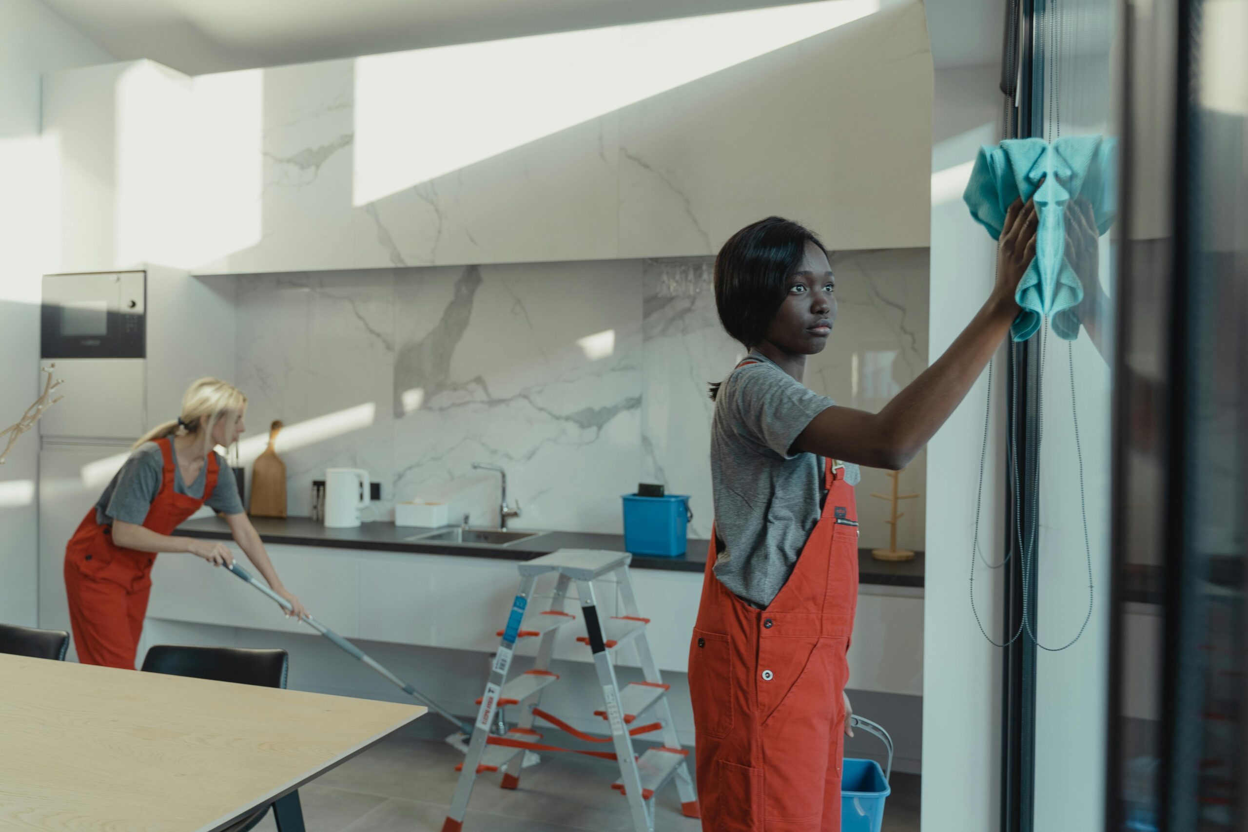 Professional cleaners completing assigned cleaning work